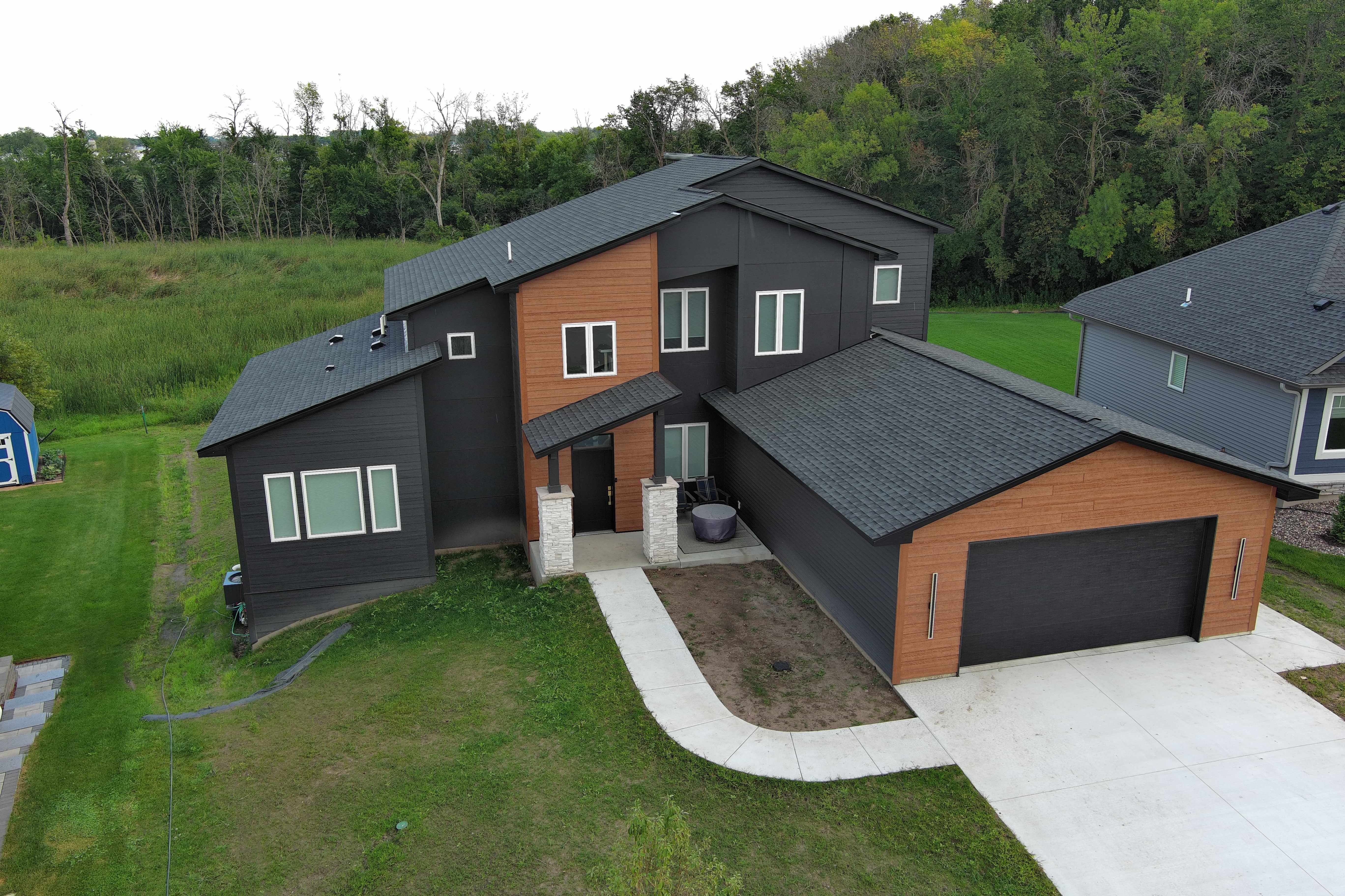 Aerial drone view of modern home